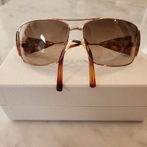 Prada tortoise with gold sunglasses